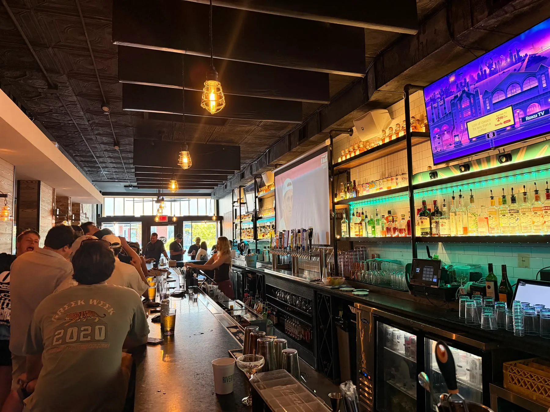 A busy afternoon along the Social 52 bar