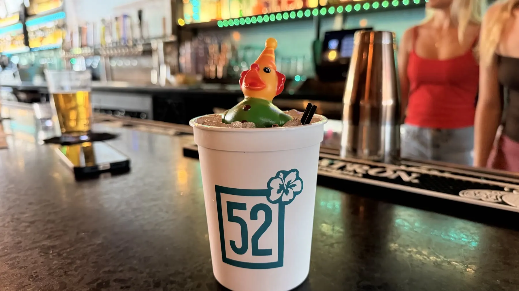 A playful Social 52 cocktail on the bar